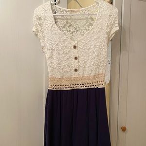 Cream and navy blue sundress with lace detailing